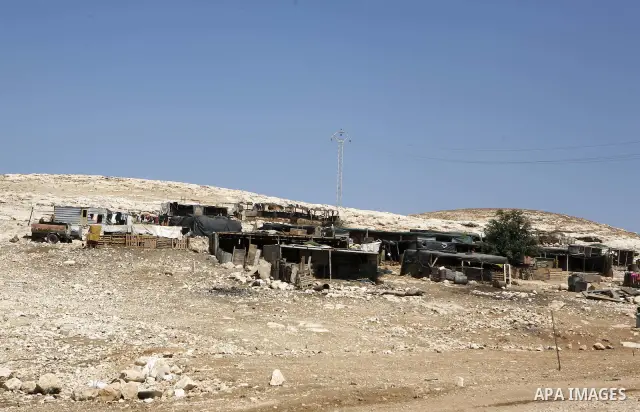 General view to the Palestinian Bedouin tents on the road between Jericho and Ramallah on July 15, 2010 as Palestinian bedouins live hard life in the West Bank. Photo by Eyad Jadallah