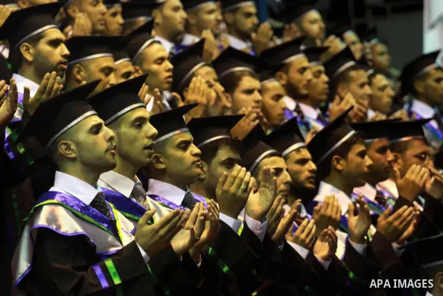 Palestinian students attend their 11th graduating celebration in the College of Applied Sciences in Gaza city on July 14 2010. Photo by Mohammed Asad