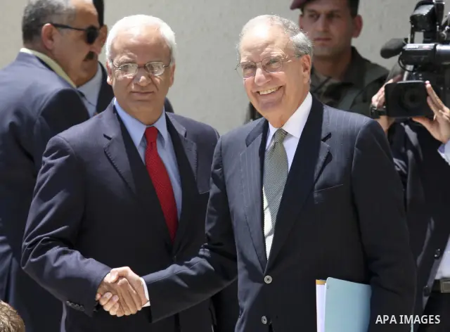 President Barack Obama's special envoy to the Middle East, George Mitchell welcomed by Saeb Erekat, Senior Palestinian negotiator as he arrives in the West Bank town of Ramallah On 17 July 2010, for a meeting with the Pa...