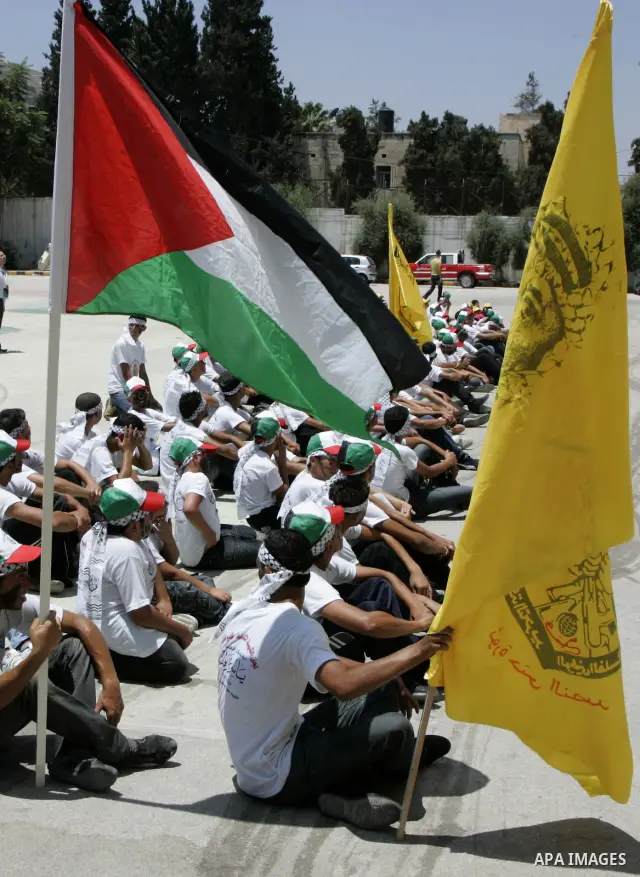 Palestinian children from the Fatah party participate in a training session during a summer camp in the West Bank city of Nablus, Sunday, July 18, 2010. Photo by Wagdi Eshtayah