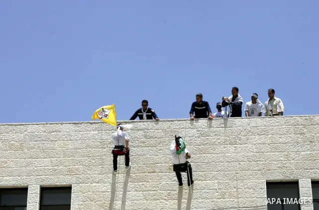 Palestinian children from the Fatah party participate in a training session during a summer camp in the West Bank city of Nablus, Sunday, July 18, 2010. Photo by Wagdi Eshtayah