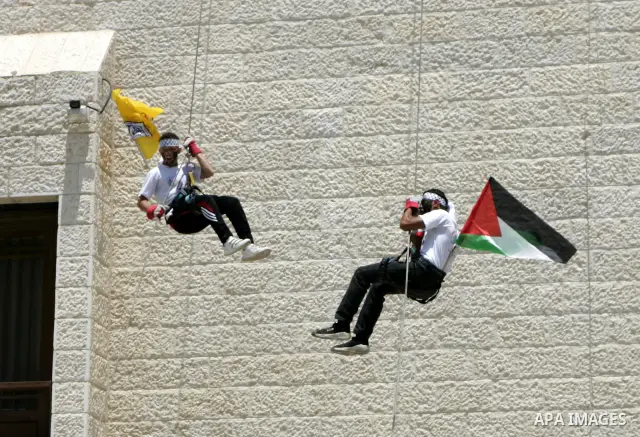 Palestinian children from the Fatah party participate in a training session during a summer camp in the West Bank city of Nablus, Sunday, July 18, 2010. Photo by Wagdi Eshtayah