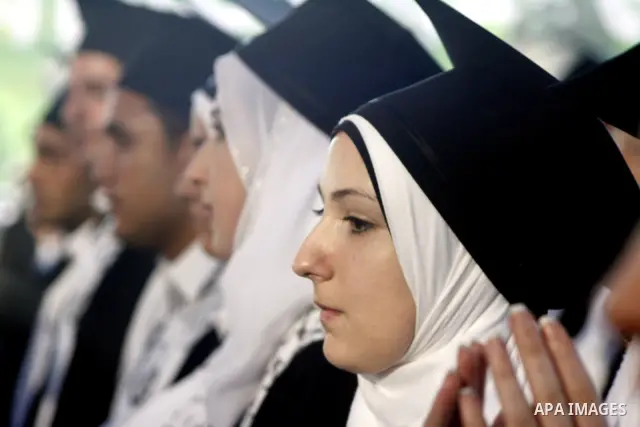 Palestinian students celebrate in their 29th graduation ceremony at Palestine Polytechnic University in the West Bank city of Hebron on July 18,2010. Photo by Mamoun Wazwaz