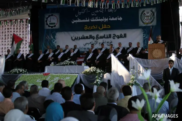 Palestinian Prime Minister Salam Fayyad participates in the 29th graduation ceremony at Palestine Polytechnic University in the West Bank city of Hebron on July 18,2010.. Photo by Mamoun Wazwaz