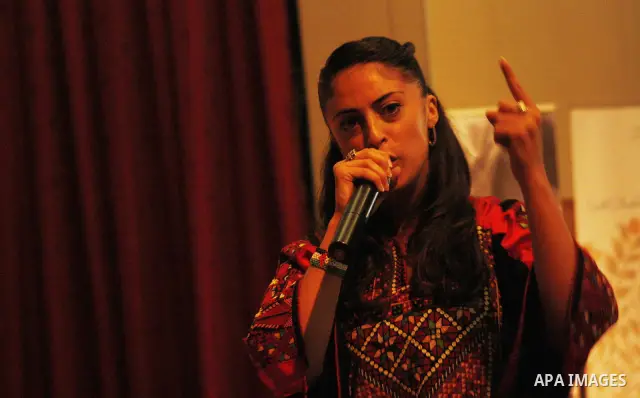 The British-Palestinian hip hop star Shadia Mansour performs during a party in the West Bank city of Hebron on July 20 2010. Mansour has a Palestinian origins and most of her songs are pro-Palestinians. Photo by Mamoun W...