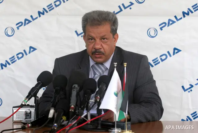 A Palestinian member from the ministry of Education, Merwan Sharaf announces the results of general secondary school in Gaza city on July 22,2010. The Ministry of Education in Gaza Strip and the West Bank announced the r...