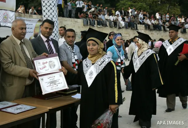 Palestinian students are seen during their graduation ceremony in Al Quds University in the West Bank city of Nablus, Sunday, July 24, 2010. Photo by Wagdi Eshtayah