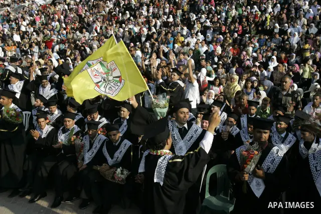 Palestinian students are seen during their graduation ceremony in Al Quds University in the West Bank city of Nablus, Sunday, July 24, 2010. Photo by Wagdi Eshtayah