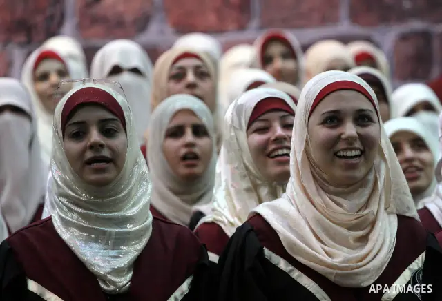 Palestinian students are seen during their graduation ceremony in the Islamic University in Gaza city on July 25, 2010. Photo by Mohammed Asad