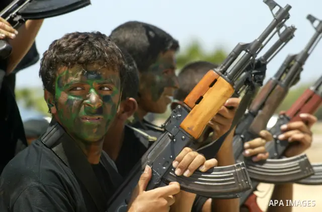 Palestinian security cadets perform during an exercise at their graduation ceremony in Gaza City, Monday, July 26, 2010. Photo by Ashraf Amra
