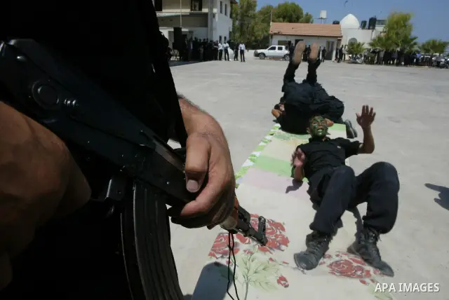 Palestinian security cadets perform during an exercise at their graduation ceremony in Gaza City, Monday, July 26, 2010. Photo by Ashraf Amra