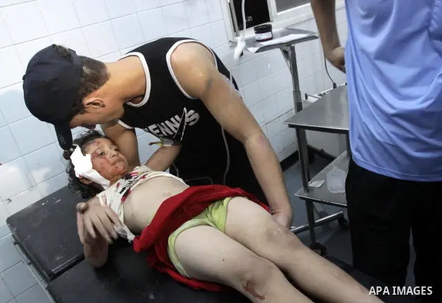 A wounded Palestinian girl receives treatment at al-Shifa hospital in Gaza City, July 31, 2010. Israeli war jets struck on Friday night three targets in western Gaza city and in central and southern Gaza Strip, wounding...