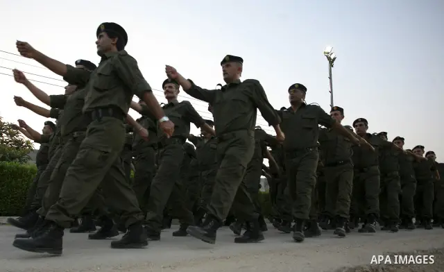 Members of the Palestinian security forces demonstrate their skills during a graduation ceremony in the West Bank city of Jericho, July 31, 2010. Photo by Eyad Jadallah