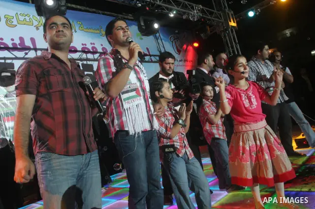 Member of the Birds of Paradise team sing during an Islamic song festival in Gaza City on August 3, 2010. Photo by Mohammed Asad