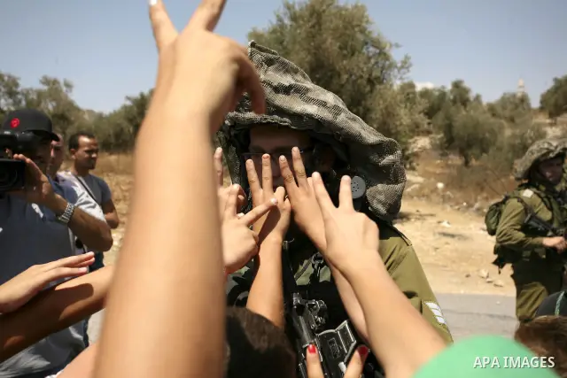 Demonstrators take part in a protest in the West Bank village of Nabi Saleh, on 06 August 2010. Residents of the village protest weekly against the neighbouring Jewish settlement of Halamish and the lack of water supply....