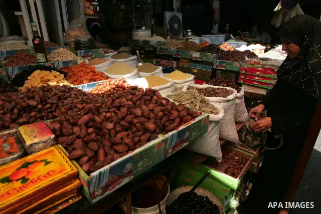 Palestinians shop at a traditional market in the first day of the holy month of Ramadan in Rafah in the southern Gaza Strip on August 11,2010. Muslims all over the world fast from dawn to dusk during the holy month of Ra...