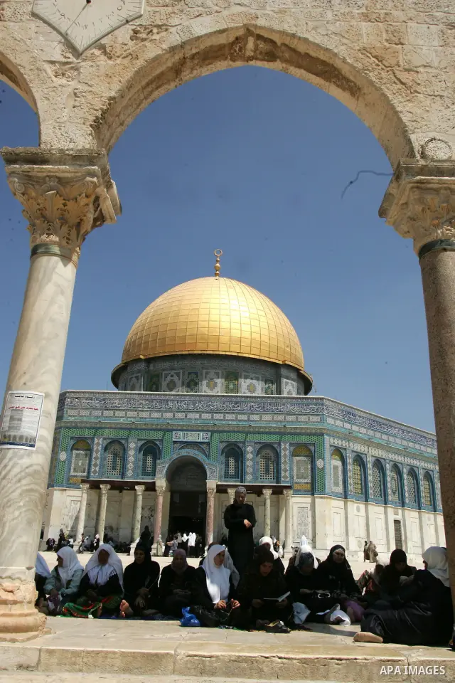 Palestinian Muslim women pray in front of the Dome of the Rock on the compound known to Muslims as al-Haram al-Sharif and to Jews as Temple Mount during the first Friday of the holy month of Ramadan in Jerusalem's Old Ci...