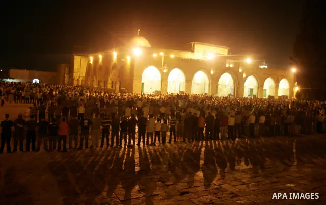 Muslims pray in front of Al-Aqsa mosque on the compound known to Muslims as al-Haram al-Sharif and to Jews as Temple Mount during on the thirteenth day of the holy month of Ramadan in Jerusalem's Old City August 23, 2010...