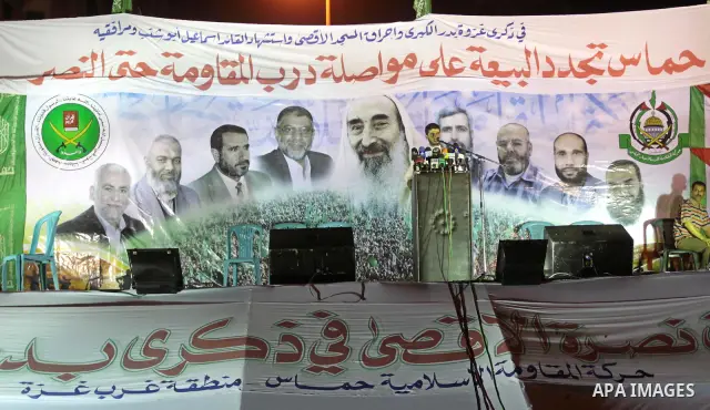 A Palestinian Hamas supporter speaks during celebration for the Islamist movement in Gaza City on August 27,2010 . Photo by Mohammed Asad