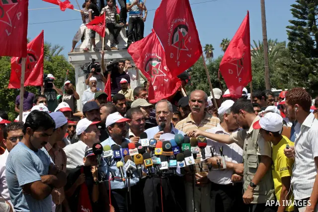Palestinian supporters of Democratic Front for the Liberation of Palestine during a rally calling for reconciliation between Fatah and Hamas in Gaza City on August 28,2010 . Photo by Mohammed Asad