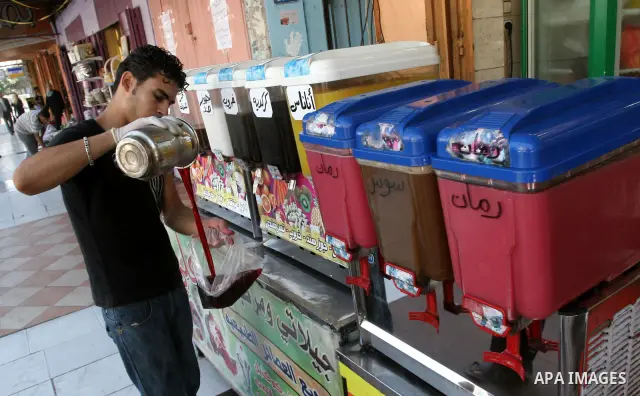 Palestinian vendor prepares different types of juice at his shop on the nineteenth day of the holy month of Ramadan in Gaza City on August 29,2010 . Muslims all over the world fast from dawn to dusk during the holy month...