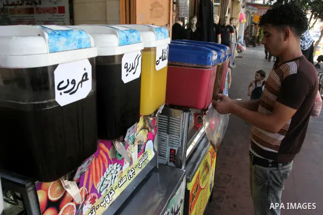 Palestinian vendor prepares different types of juice at his shop on the nineteenth day of the holy month of Ramadan in Gaza City on August 29,2010 . Muslims all over the world fast from dawn to dusk during the holy month...