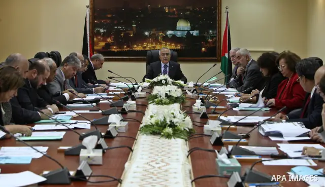 Palestinian Prime Minister Salam Fayyad heads the Palestinian cabinet meeting in the West Bank city of Ramallah on August 30,2010. Photo by Mustafa Abu Dayeh \ pool
