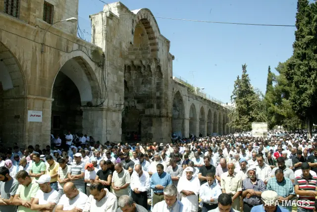 Muslims pray in front of the Dome of the Rock on the compound known to Muslims as al-Haram al-Sharif and to Jews as Temple Mount during the final Friday of the holy month of Ramadan in Jerusalem's Old City September 3, 2...