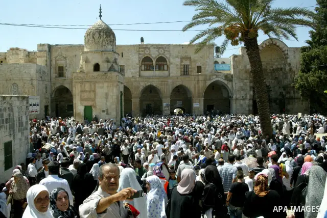 Muslims pray in front of the Dome of the Rock on the compound known to Muslims as al-Haram al-Sharif and to Jews as Temple Mount during the final Friday of the holy month of Ramadan in Jerusalem's Old City September 3, 2...