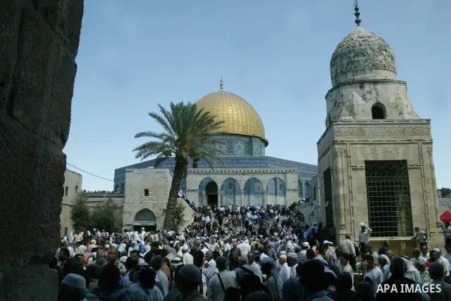 Muslims pray in front of the Dome of the Rock on the compound known to Muslims as al-Haram al-Sharif and to Jews as Temple Mount during the final Friday of the holy month of Ramadan in Jerusalem's Old City September 3, 2...