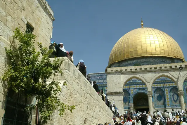 Muslims pray in front of the Dome of the Rock on the compound known to Muslims as al-Haram al-Sharif and to Jews as Temple Mount during the final Friday of the holy month of Ramadan in Jerusalem's Old City September 3, 2...