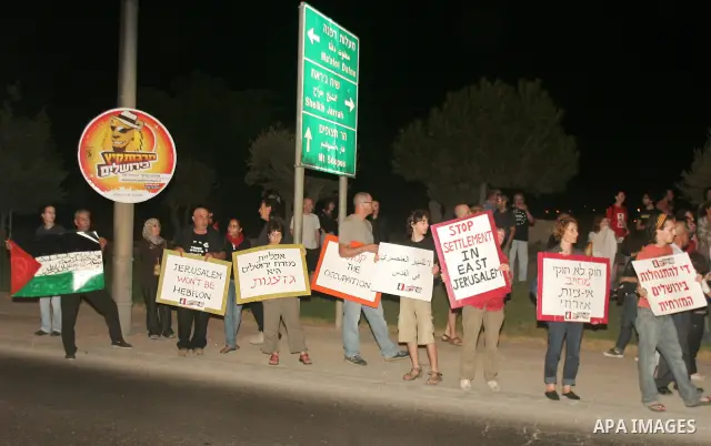 Israeli and Palestinian activists take part in a weekly demonstration on September 4, 2010 in the mostly Arab neighborhood of Sheikh Jarrah in Jeruslaem where a protest is held against Israeli settlements and occupation...