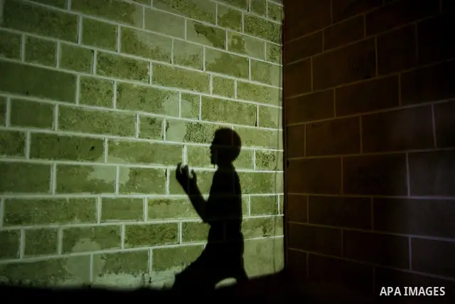 A Palestinian Muslim worshipper Silhouetted as he prays the night prayers of Laylat Al Qadr, in Al-Omari Mosque in Gaza City, on Sept. 6, 2010. Laylat-al-Qadr or The Night of Power commemorates the night when Muslims bel...