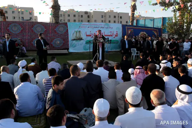 Palestinian Prime Minister in Gaza Strip, Ismail Haniyeh attends the early morning Eid Al-Fitr prayer in the northern Gaza Strip on September 9, 2010. Muslims across the world are celebrating the first day of Eid al-Fitr...
