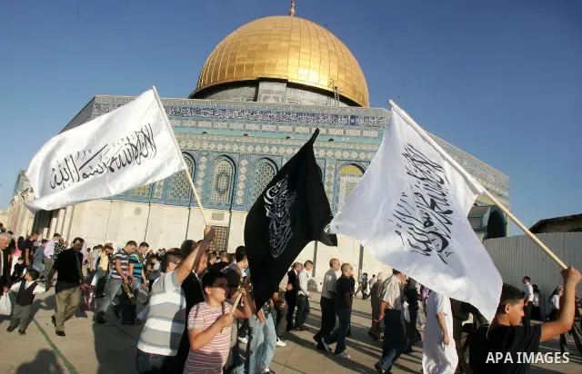 Palestinian Muslims in the courtyards of Al-Aqsa Mosque compound during the first day of Eid al-Fitr which marks the end of the Muslim fasting month of Ramadan, in the Al Aqsa Mosque Compound in Jerusalem's Old City, Fri...