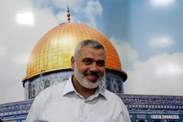Palestinian Prime Minister in Gaza Strip, Ismail Haniyeh recieves Palestinians at his house during the second day of Eid al-Fitr which marks the end of the Muslim fasting month of Ramadan, in Gaza city, Sept. 11, 2010. P...