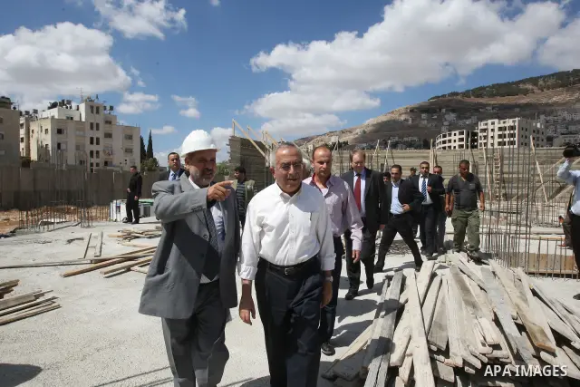 Palestinian Prime Minister Salam Fayyad during his visiting to the West Bank city of Nablus and placing the corner stone for the Mukata'a building in Nablus, Sept. 14, 2010 . Photo by Mustafa Abu Dayeh / Pool