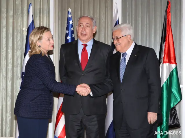 Palestinian President Mahmoud Abbas (Abu Mazen) during a meeting with Israeli Prime Minister,Benjamin Netanyahu and the U.S. Secretary of State, Hillary Rodham Clinton in Jerusalem on Sept 15,2010. Clinton is in the regi...
