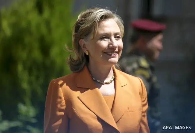 U.S. Secretary of State Hillary Clinton smiles upon her arrival for a meeting with Palestinian President Mahmoud Abbas in the West Bank city of Ramallah Sept. 16, 2010. The United States said on Wednesday it believed Isr...