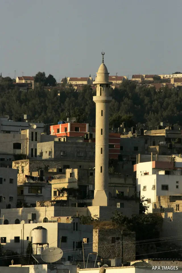 Palestinian village of Azmot is seen near the jewish settlement of Allon Moreh (background), in the West Bank city of Nablus, Thursday, Sept. 16, 2010. US Secretary of State Hillary Rodham Clinton arrived to the Palestin...