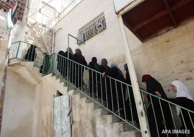 Palestinian women gather at the house of Samir Sarhan who was shot dead the day before by a Jewish settlement guard, at the family house in the Arab east Jerusalem neighbourhood of Silwan on September 23, 2010. Photo by...