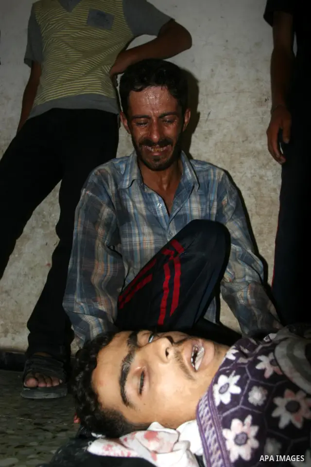 Palestinian relatives of fisherman Mohammed Baker mourn during his funeral in Gaza September 24, 2010. The Israeli navy fired on a Palestinian boat off the northern Gaza Strip on Friday, killing Baker, the territory's Ha...