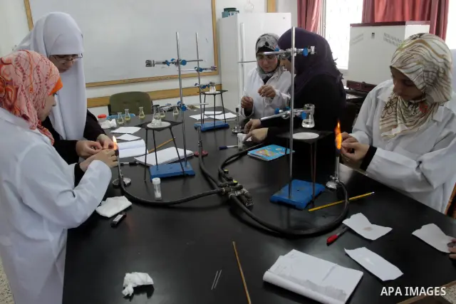 Palestinian students attend the second school year after the Israeli war on Gaza Strip, in Gaza City on Sept. 26,2010 .The Islamic University was bombed and destroyed the scientific laboratories building during the 22-da...