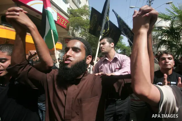 Palestinians attend a rally organized by the Islamic Jihad movement, marking the 10th anniversary of Al-Aqsa Intifada 'uprising', in Khan Younis,in the southern Gaza Strip, on Oct. 1, 2010. Photo by Khaled Khaled
