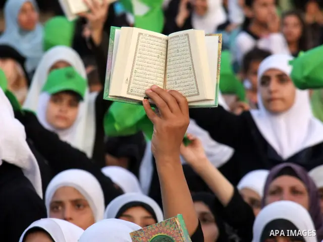 Palestinians attend a celebration organized by Awqaf Ministry to graduate 13 thousand person memorize the holy Quran in Gaza City on Oct 2,2010 . Photo by Wassim Fatair