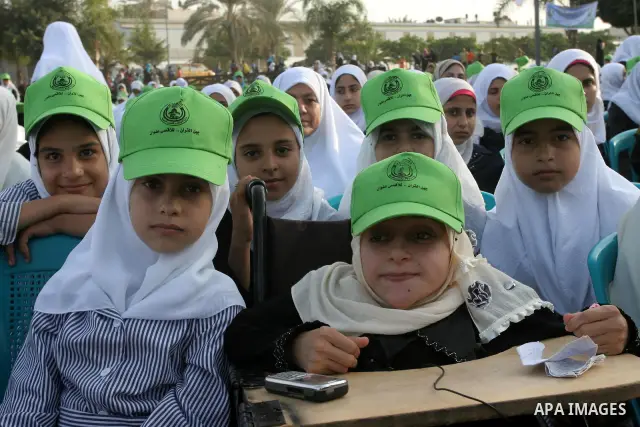 Palestinians attend a celebration organized by Awqaf Ministry to graduate 13 thousand person memorize the holy Quran in Gaza City on Oct 2,2010. Photo by Mohammed Asad