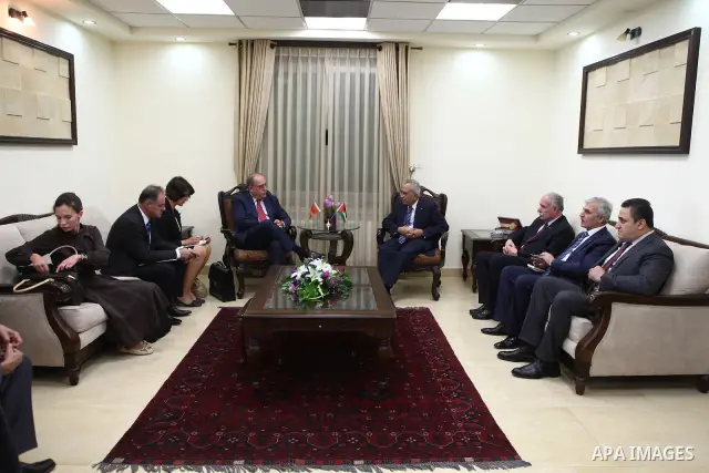 Palestinian Prime Minister Salam Fayyad during a meeting with Minister of Foreign Affairs of Montenegro, Milan Rocen in the West Bank city of Ramallah on Oct 3,2010. Photo by Mustafa Abu Dayeh / Pool