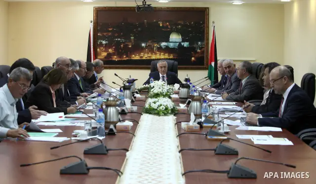 Palestinian Prime Minister Dr. Salam Fayyad , while heading the Palestinian Cabinet meeting in the West Bank city of Ramallah on October 4,2010 . Photo by Mustafa Abu Dayeh