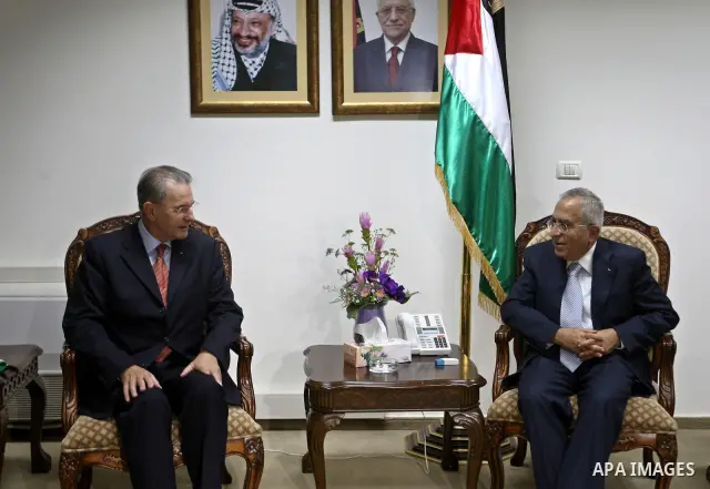 Palestinian Prime Minister Salam Fayyad during his meeting with the Chief of the International Olympic Committee, Jack Rouge in the West Bank city of Ramallah on Oct. 5,2010. Photo by Mustafa Abu Dayeh / Pool