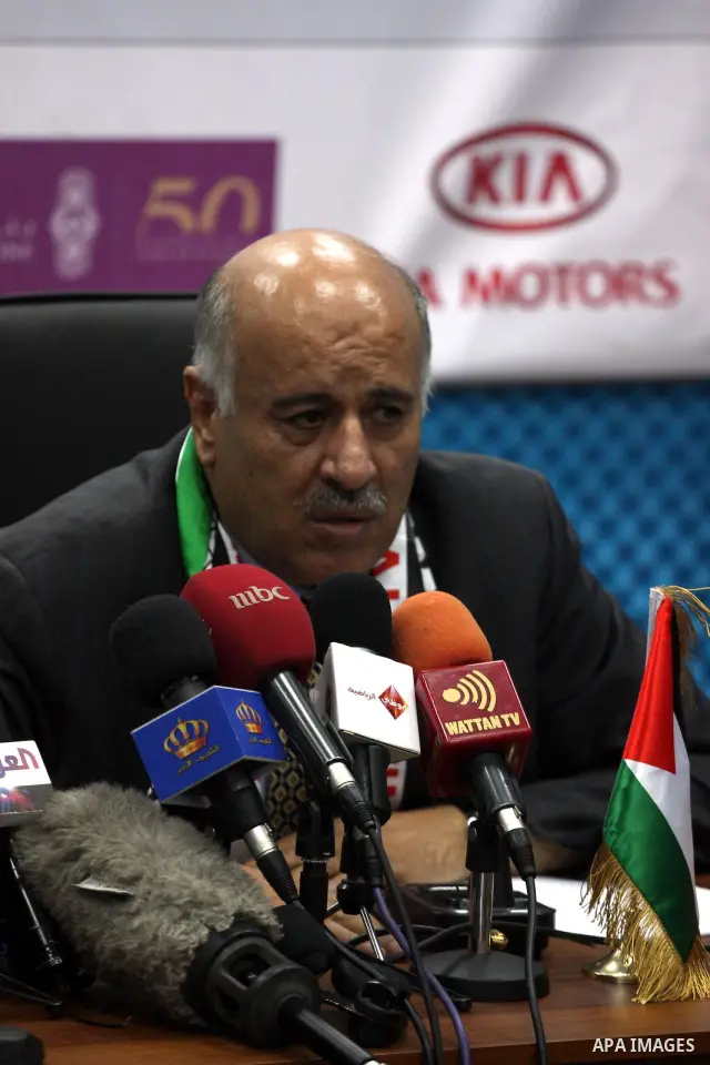 The president of the International Olympic Committee (IOC) Jacques Roggue and Palestinian Jebril Alrojob, head of Palestinian Olympic committee speak during a press conference in the West Bank City of Ramallah, 05 Octobe...